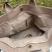 IOPELLE LO PELLE EMBOSSED 3-D SKULLS GENUINE ITALIAN LEATHER TOTE