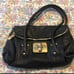 black leather clutch purse
