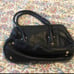 black leather clutch purse