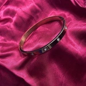 Stunning bangle bracelet, stainless steel material -Gold Tone
