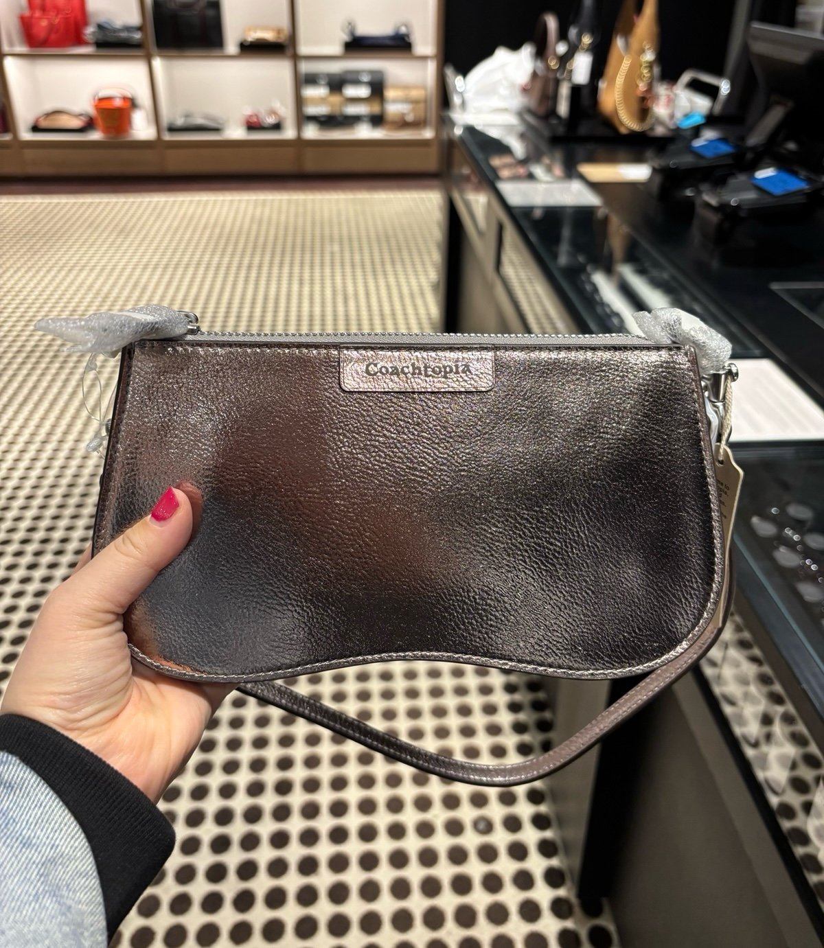 Coach Wavy Baguette Bag In Metallic Coachtopia Leather