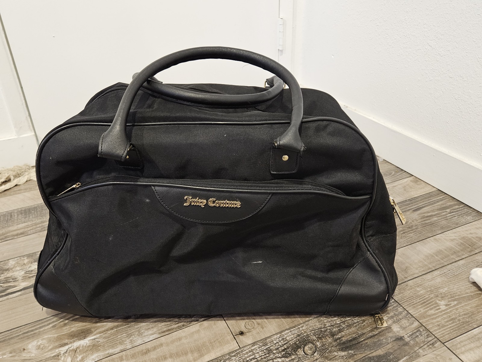 Juicy couture rolling suitcase
