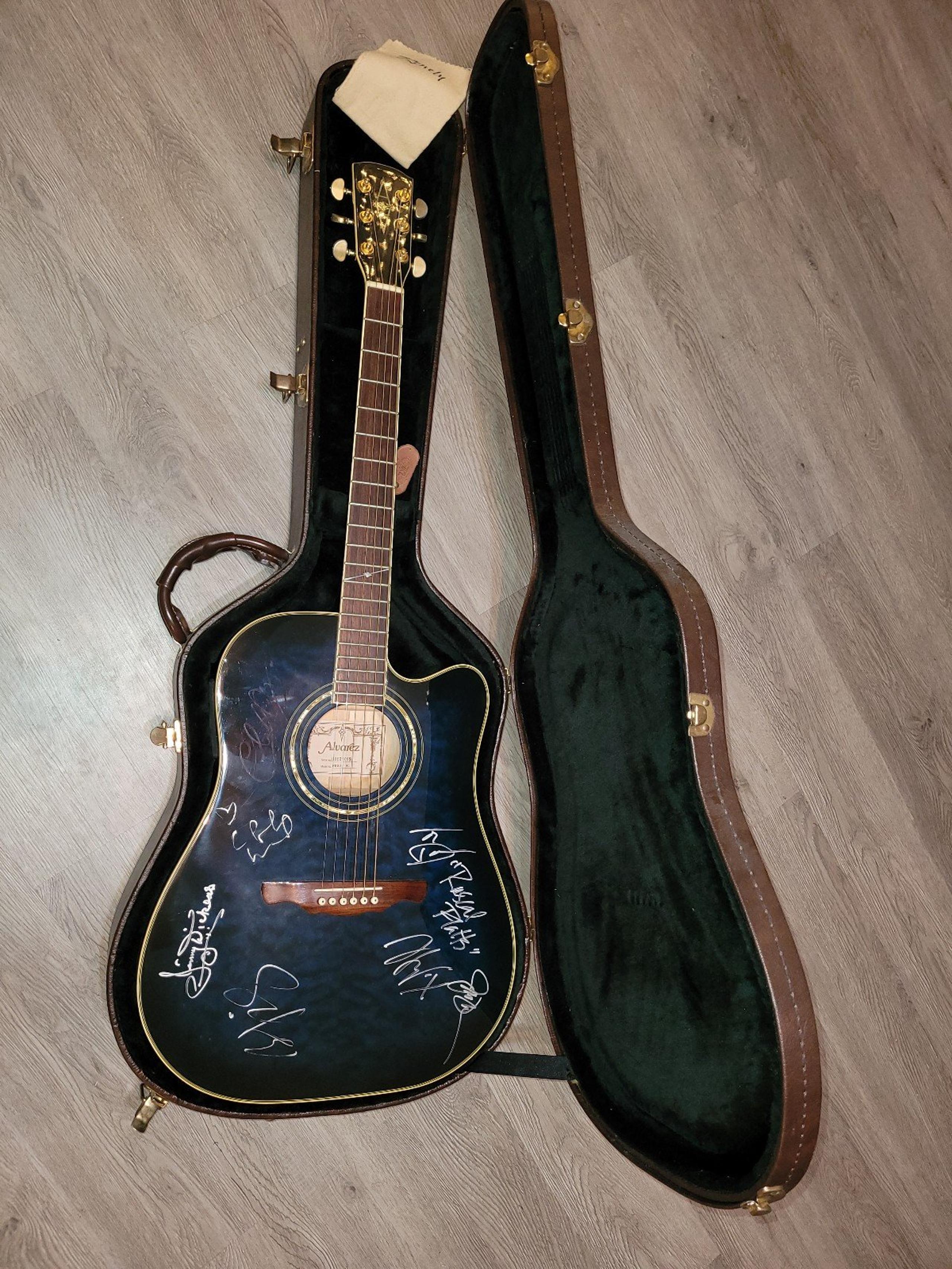 Autographed Alvarez Acoustic Guitar. Free shipping.
