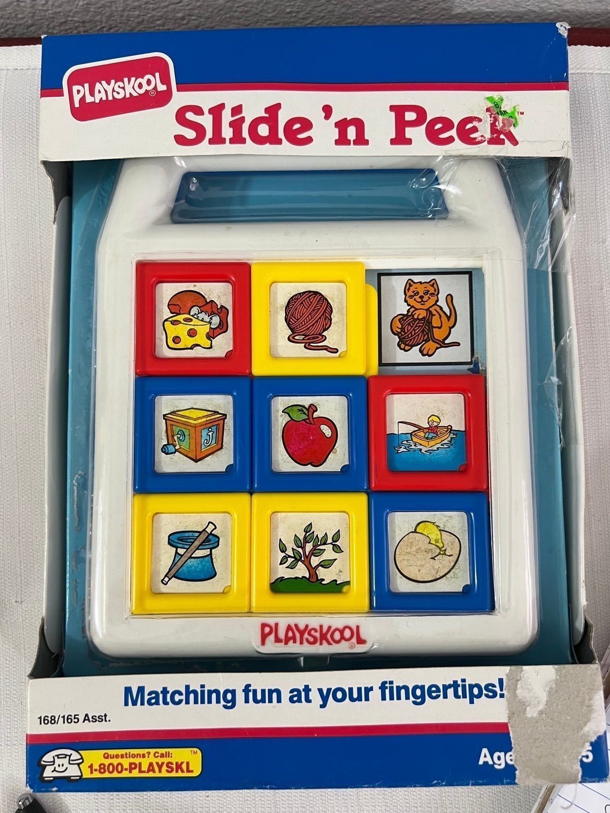 Vintage Playskool Slide N Peek NOS