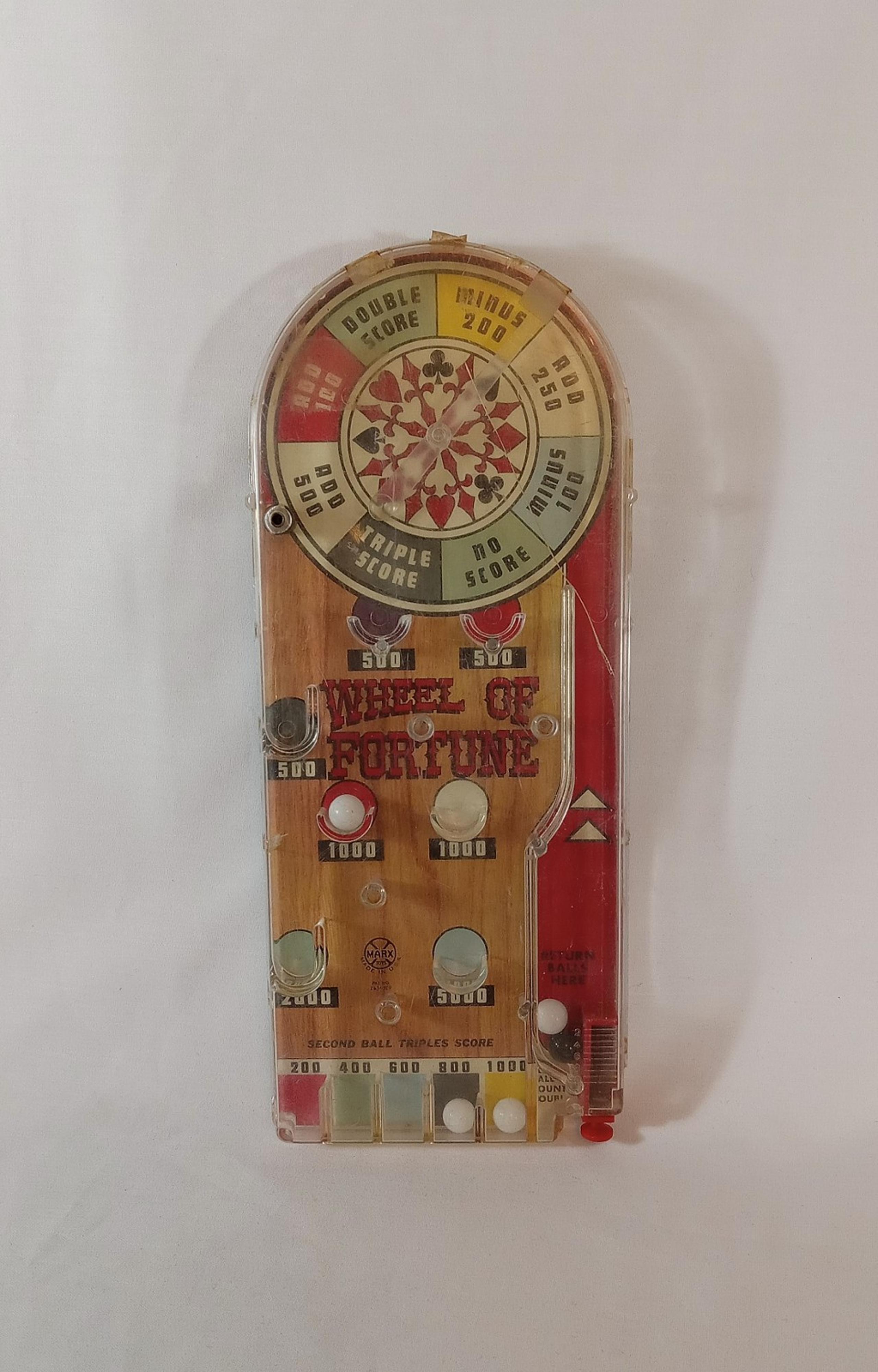 Vintage Wheel of Fortune marble game
