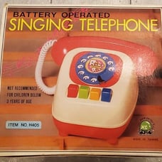 Vintage Singing Telephone Toy