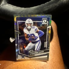 CeeDee Lamb SUPER RARE MUSCLE PANINI PRIZM YELLOW 054/149 NO.45 OPTIC 2023 CARD