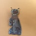 Vintage silvertone egyptian pendant….detailed