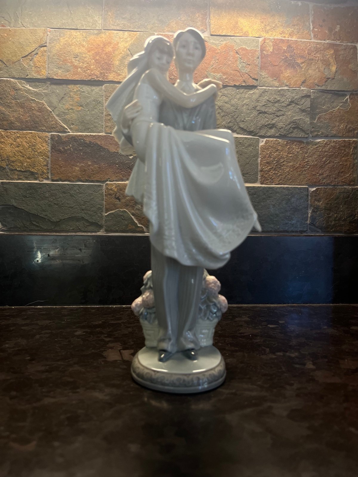 “Over the Threshold”vintage Lladro figurine.