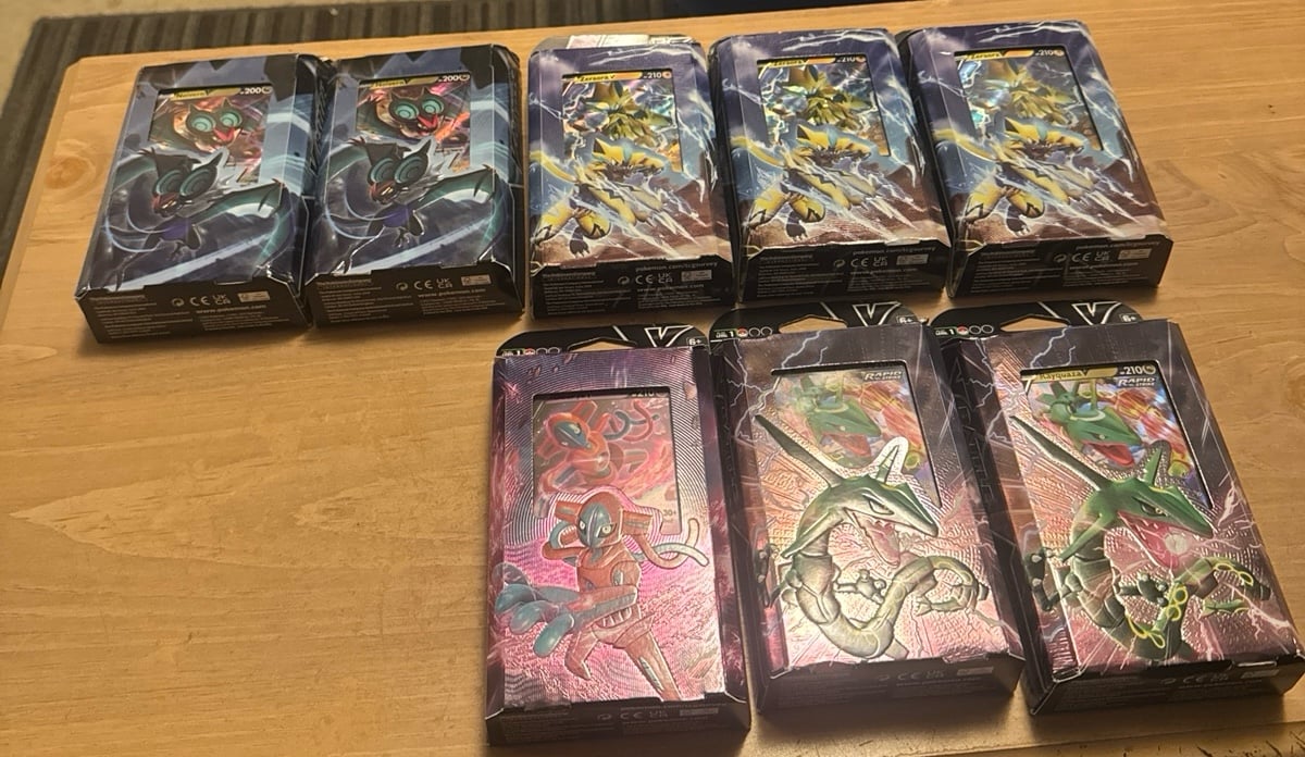 V Battle Deck Bundle 0f 8. (2 Rayquaza, 3 Zeraora, 2 Noivern, 1 Deoxy)