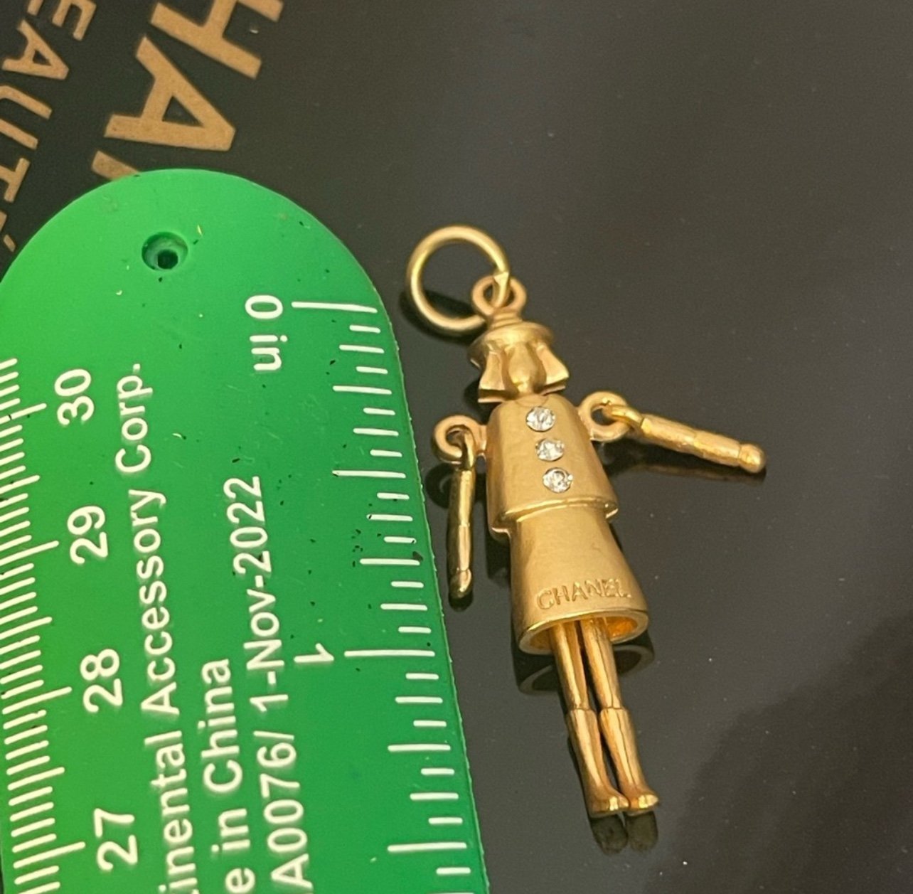 Chanel zipper puller charm