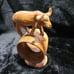 African hand crarved napkin holders.