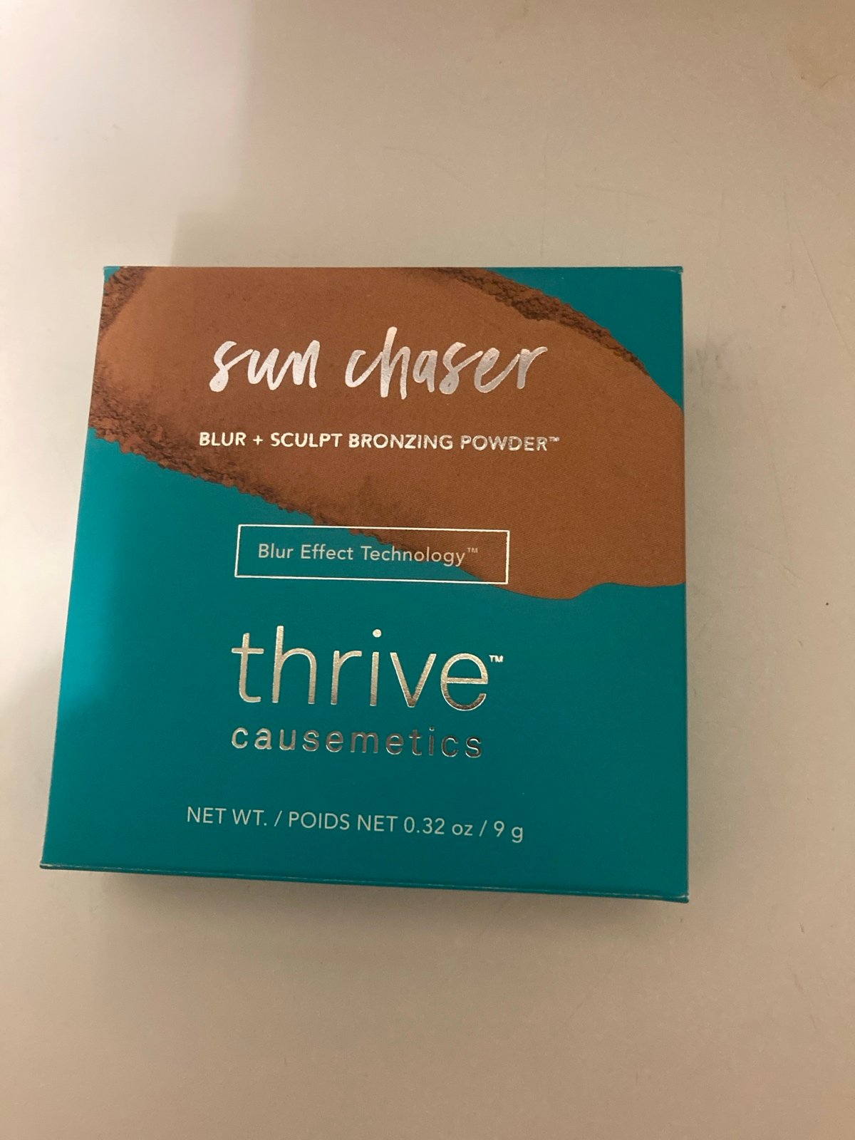Thrive, cosmetics, sun, chaser, blur, and sculpt bronzing powder