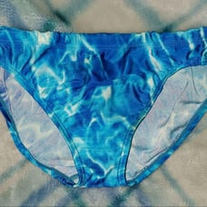 ARENA swimming trunks, size S, water surface, fabric deterioration.