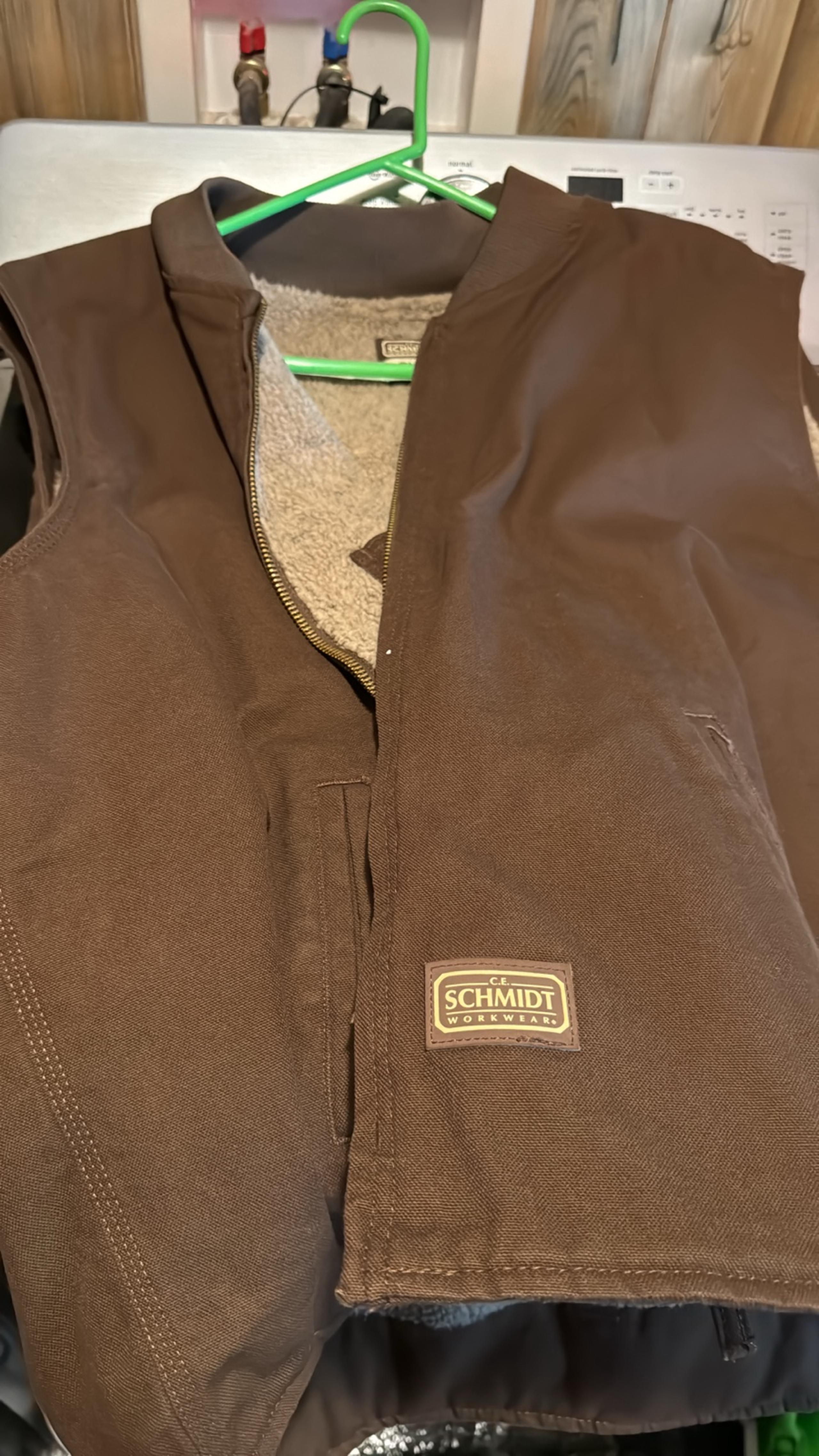 Men’s Schmidt vest brown in color very warm. Never worn only tried on