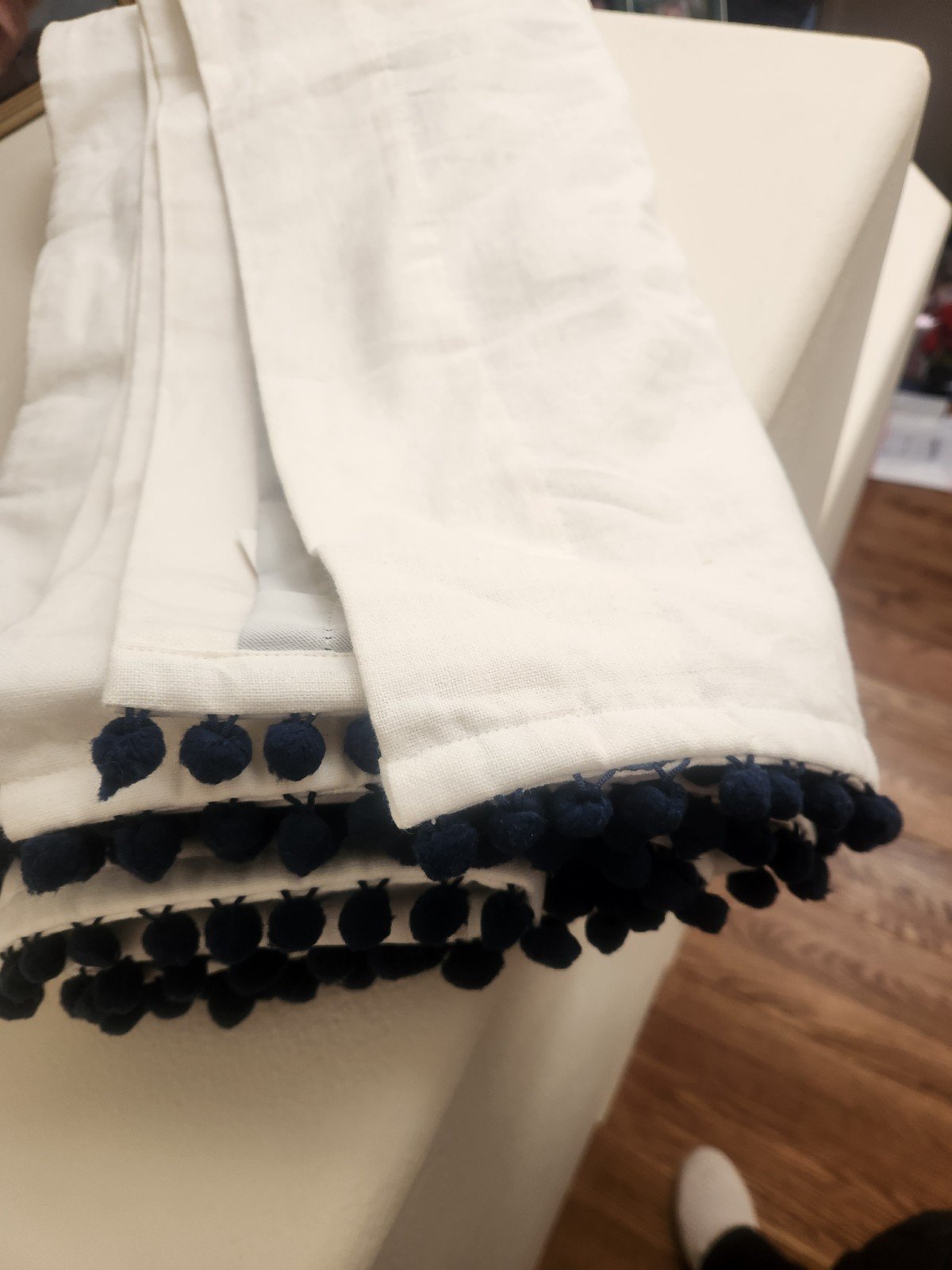 Pottery Barn blackout curtains with navy pom poms, set of 2.