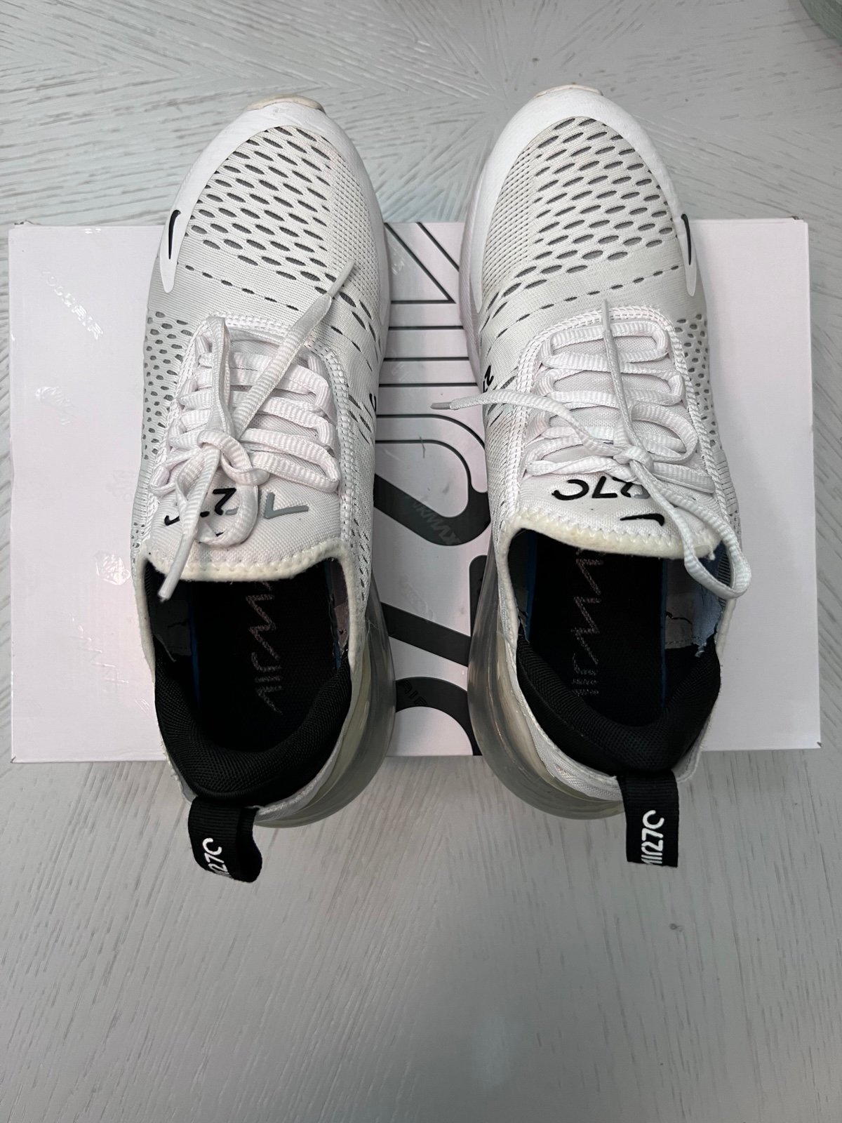 White and black Nike 270