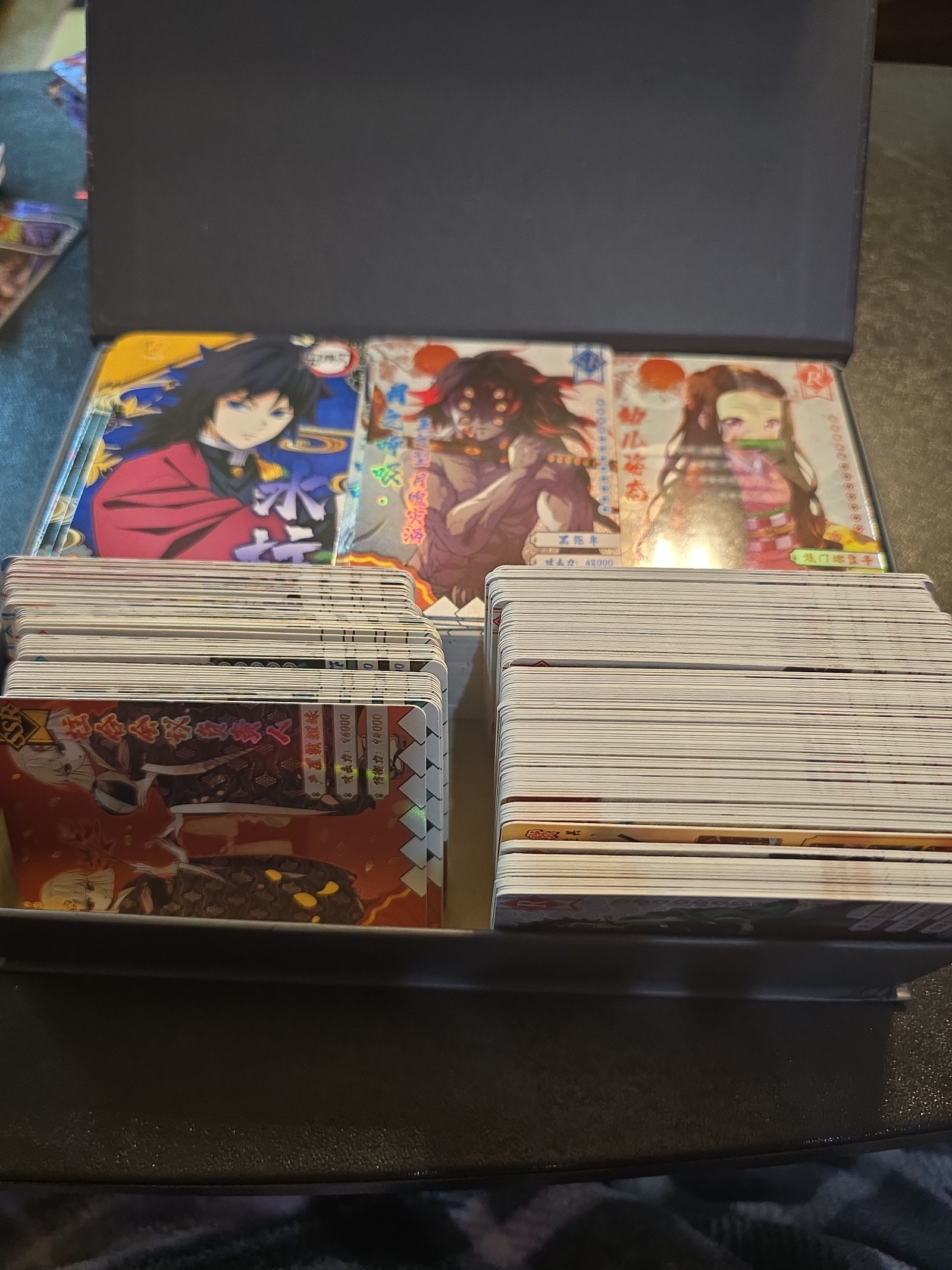 Entire boxes of Demon slayer cards