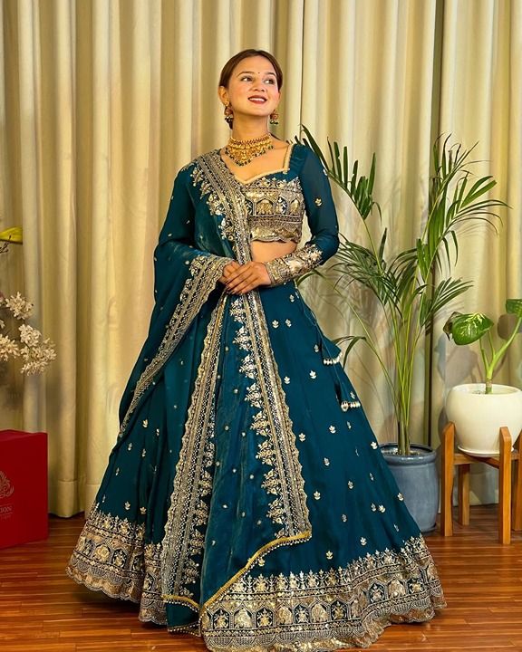 Peacock Blue Jimmy choo Lehenga choli with sequin and thread embroidery work