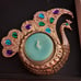 Golden colored jeweled peacock tea light holder w/4 tealights