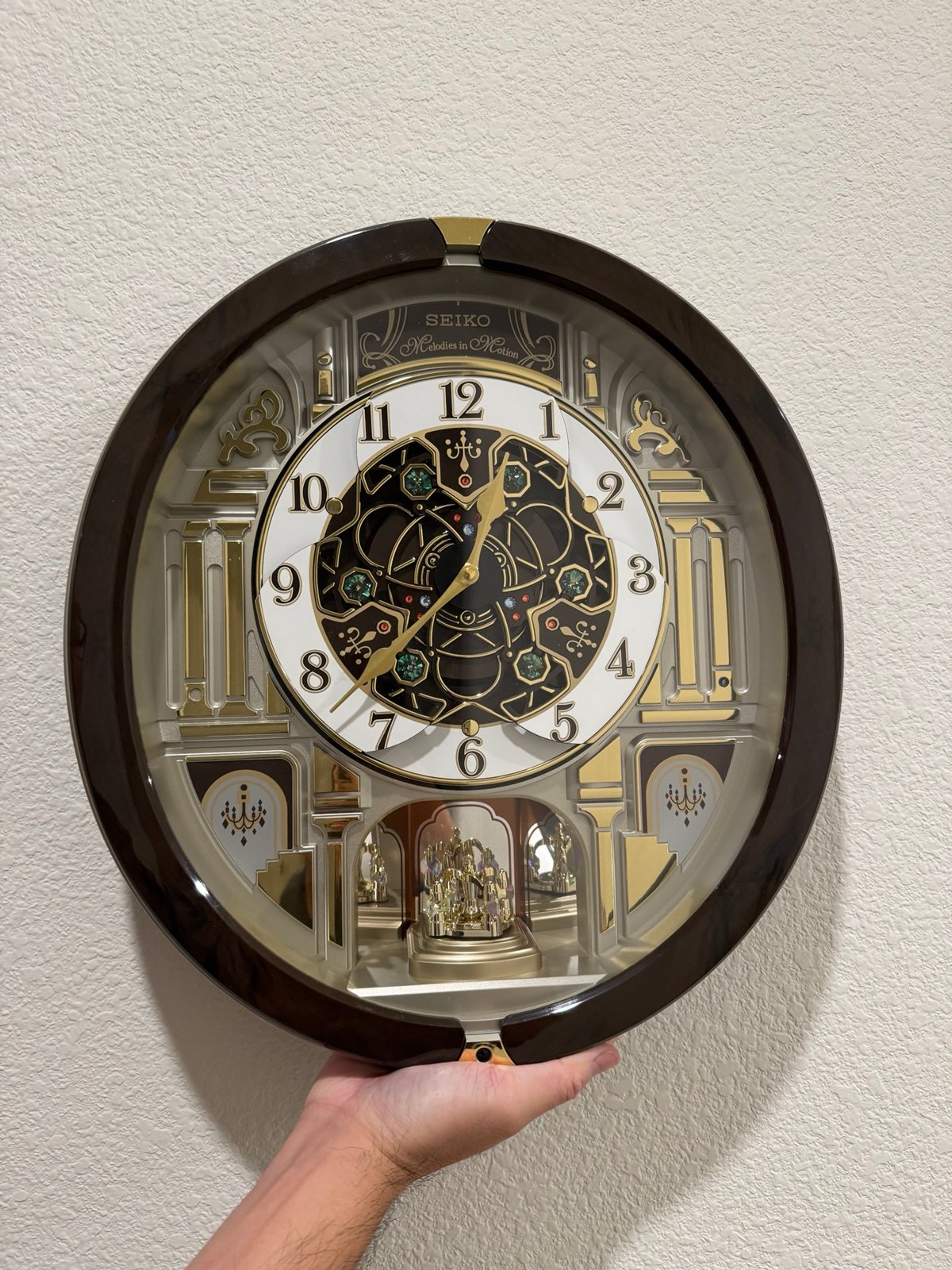 Seiko Golden Chandelier Melodies in Motion QXM394BRHZ