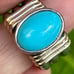 Vintage 14k yellow gold 950 Sterling Silver and turquoise blue gem ring Sz 7.25