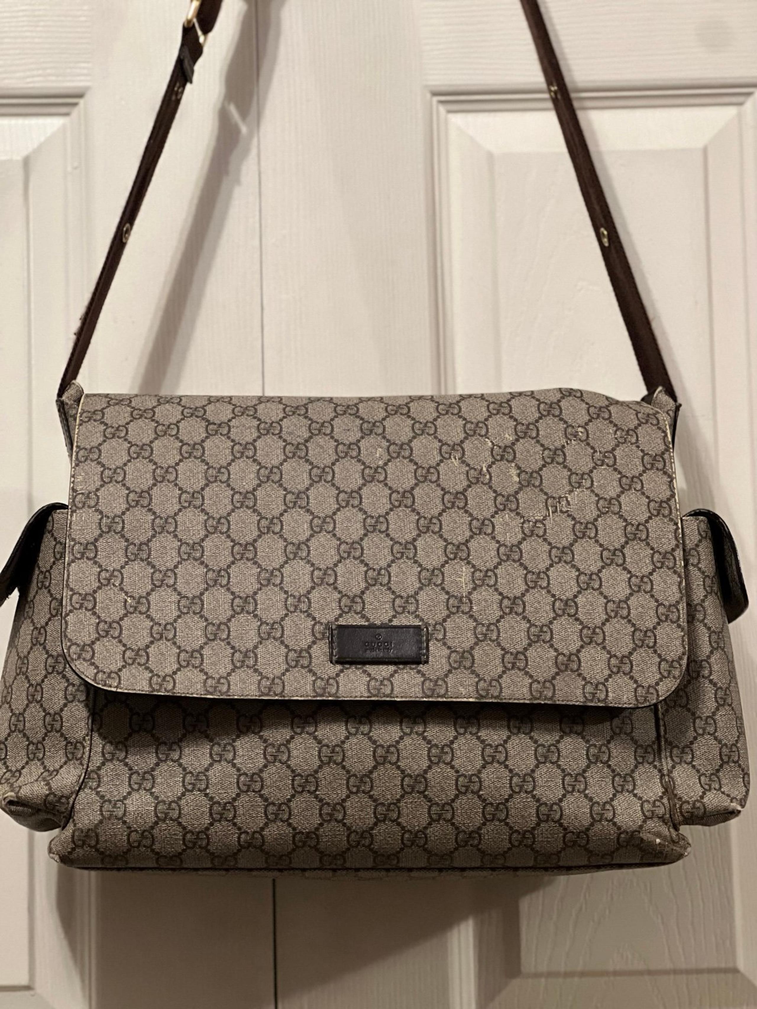 Gucci Supreme Diaper bag with changing pad