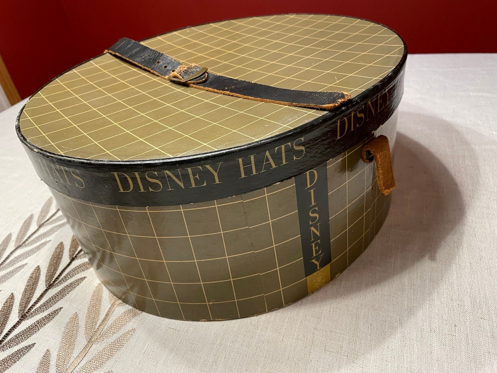 Vintage Disney Hats Co. cardboard hatbox with leather strap