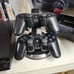 PlayStation 3 plus 2 controllers charging station and 17 games