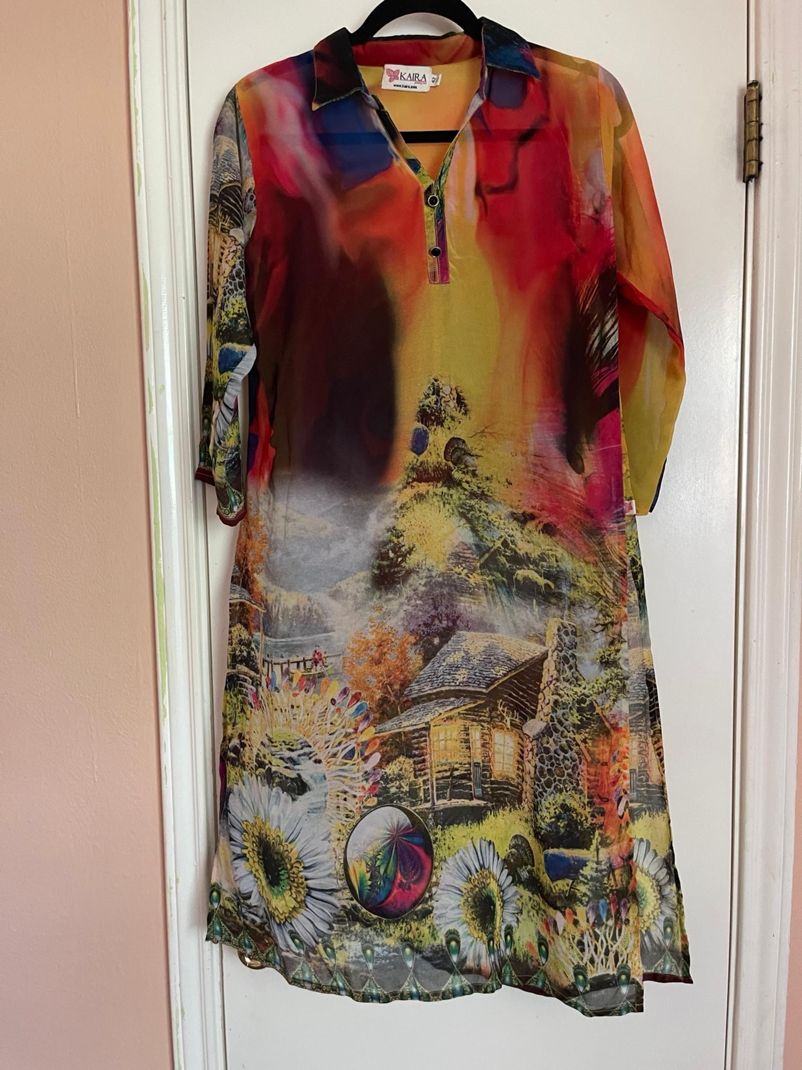 Kaira  Pretty Cover up Size on the tag Xl Read description