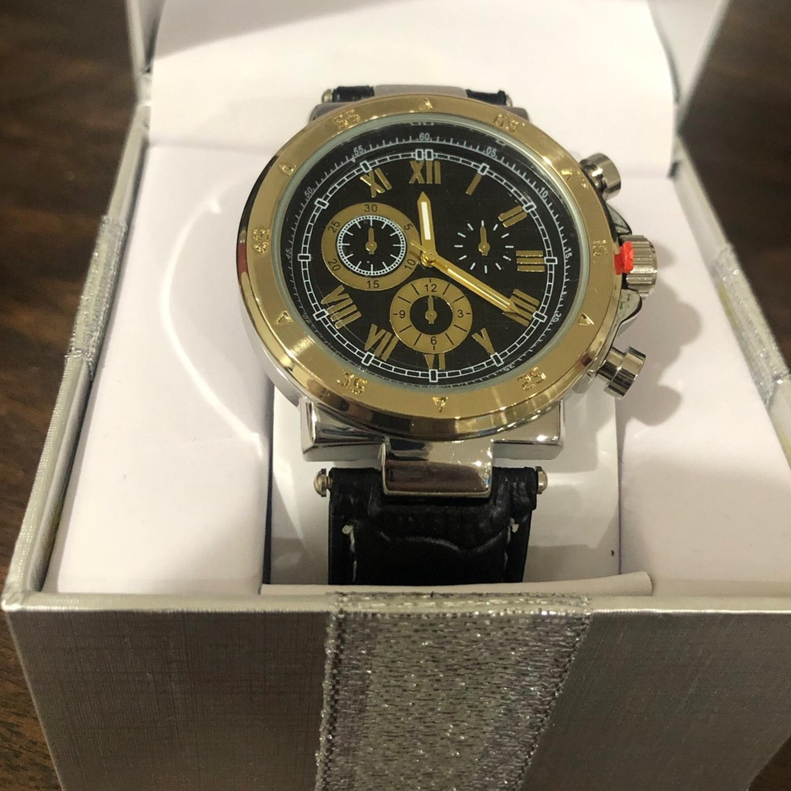 New mens gold watch