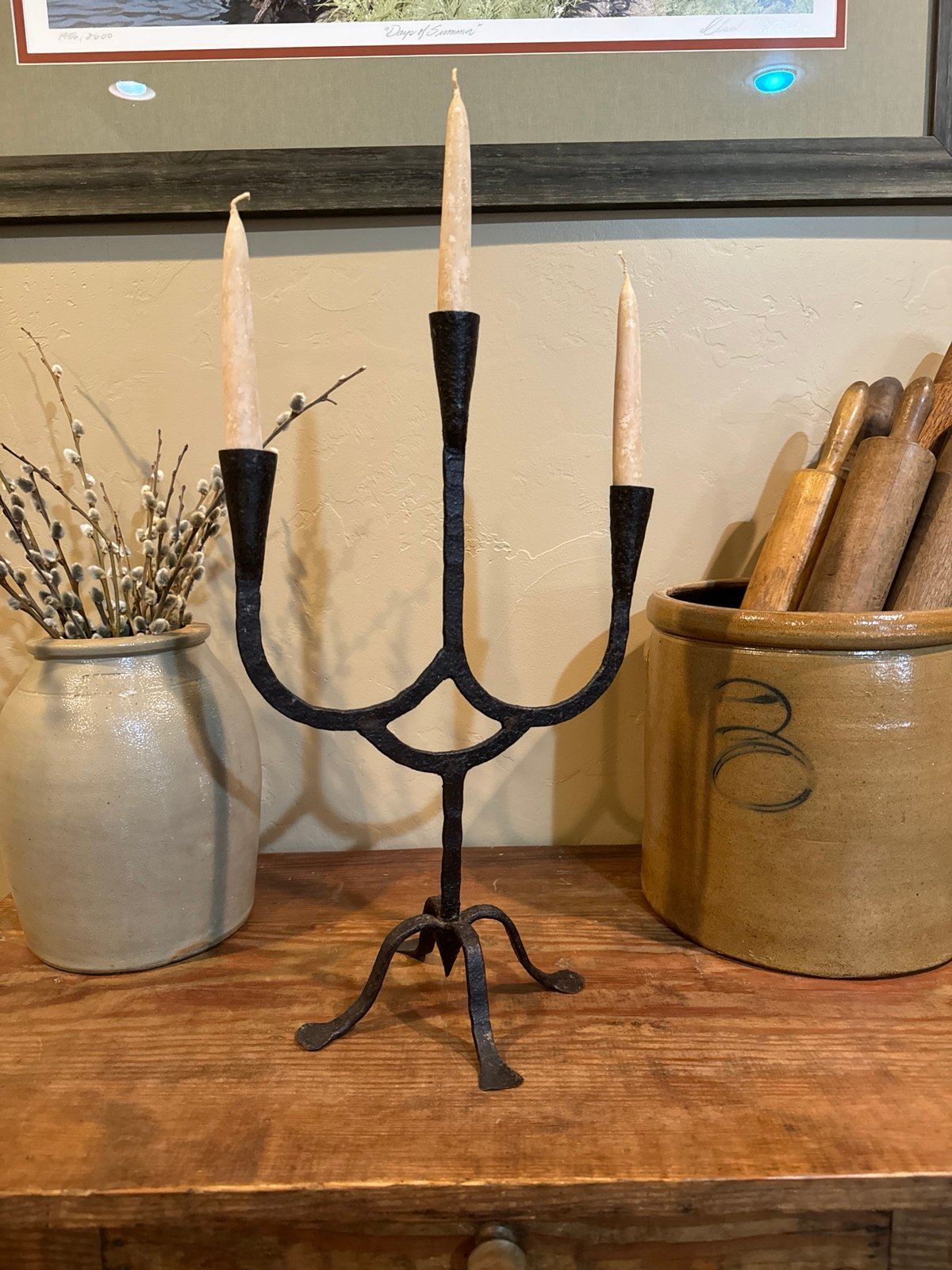 Antique primitive wrought iron candle holder