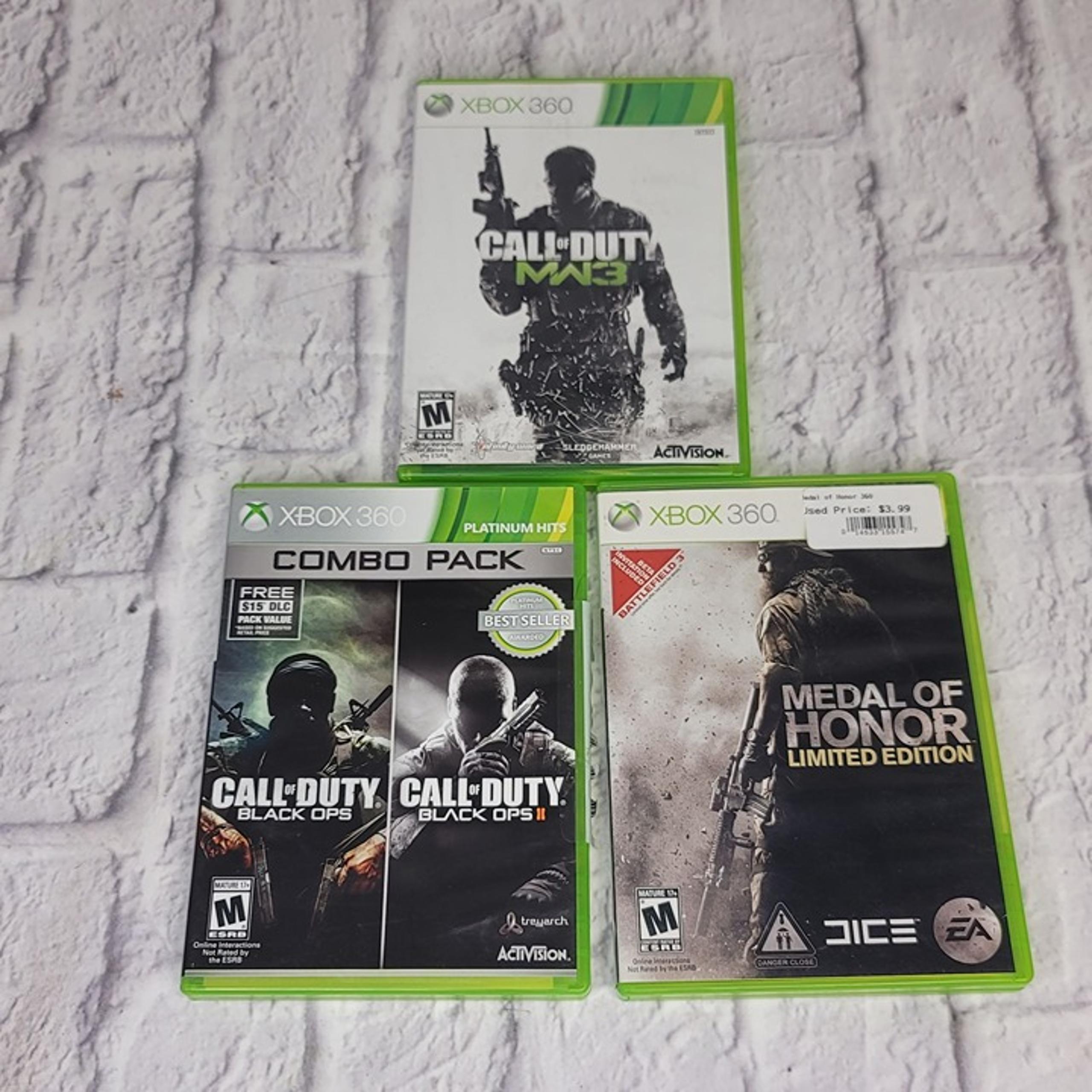 Xbox 360 Lot Of 4 Games Call Of Duty MW3 Black Ops Combo Pack Medal Of Honor Lim