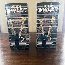 A set of 2 battery operated singing owlet is watching you!