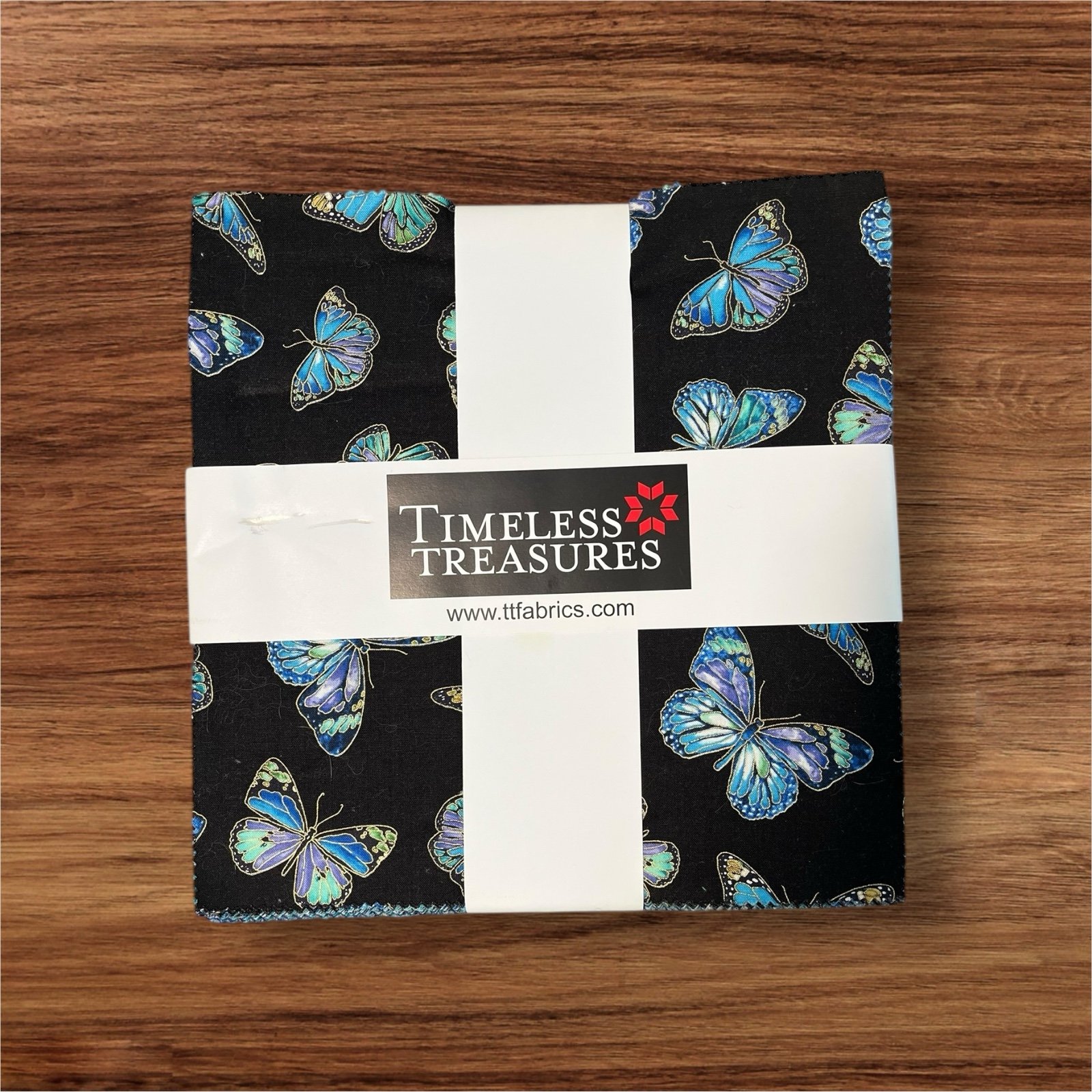 10” quilting Precut layer cake “Enchant” by MSQC - purple and teal butterfly’s