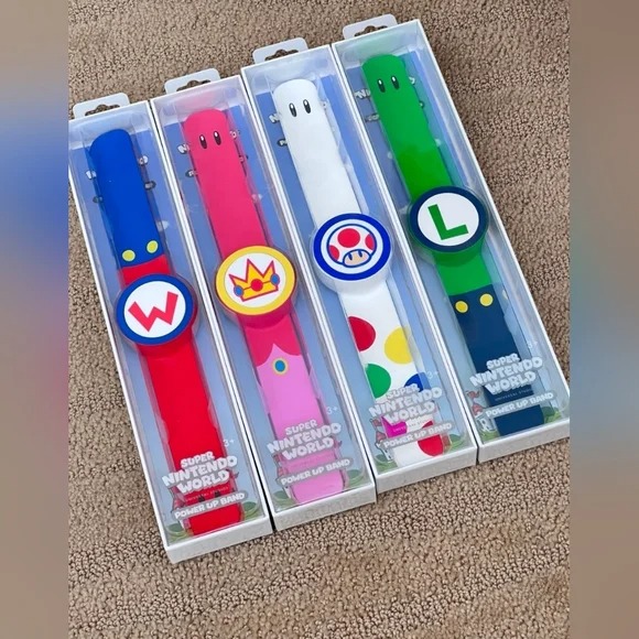 USH Super Nintendo World Mario Luigi Peach Toad Power Up Band 4 piece set