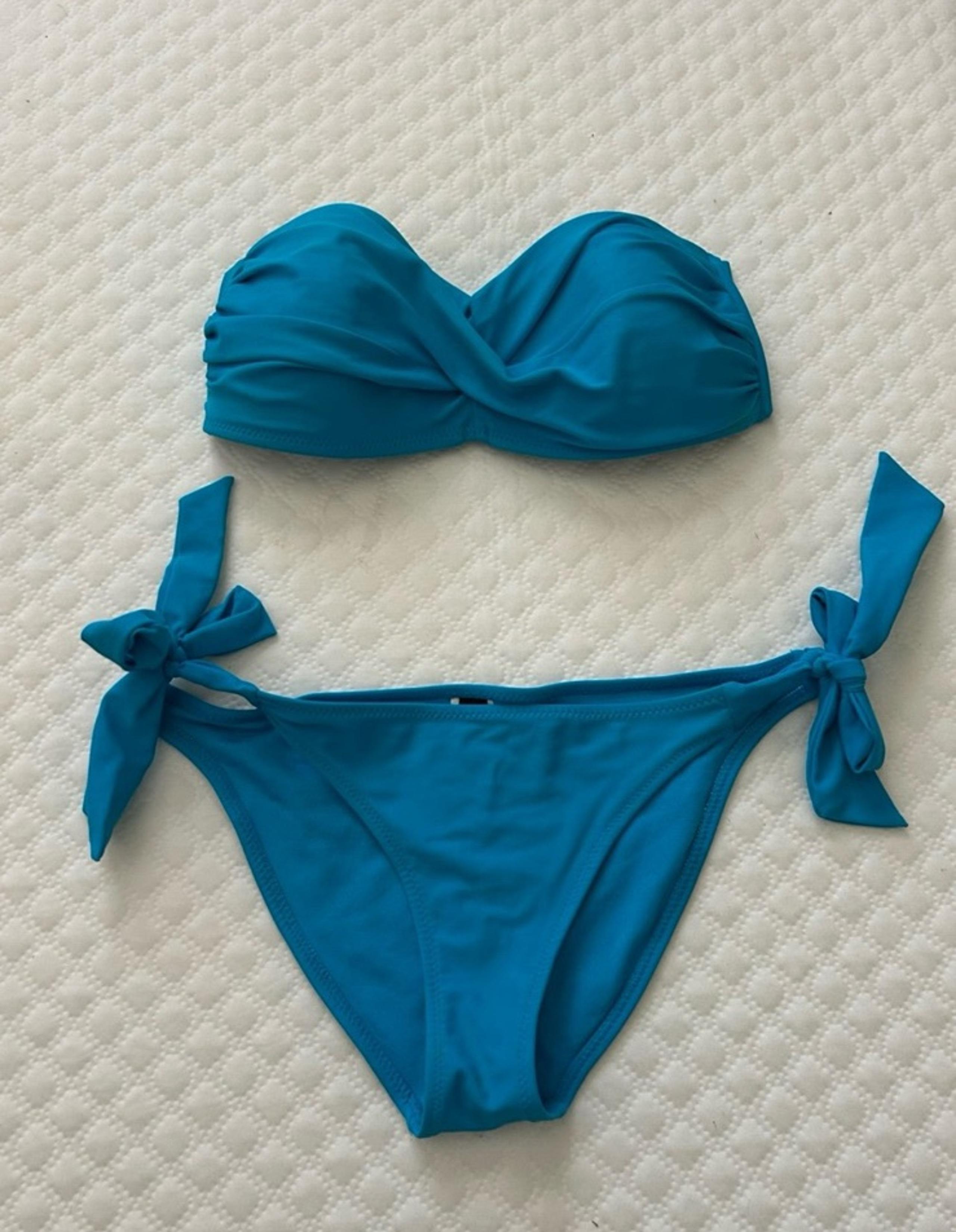Bikini: ABS Allen Schwartz
Turquoise. Top size 10, bottoms size 6.