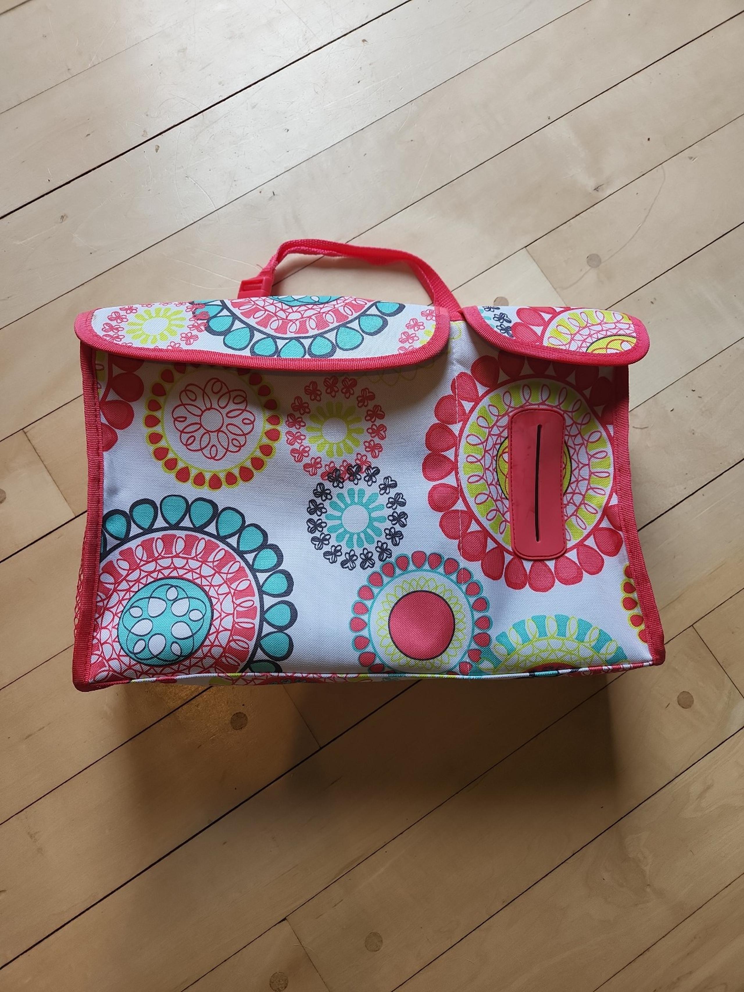 Thirty-One floral tote diaper bag for the car.