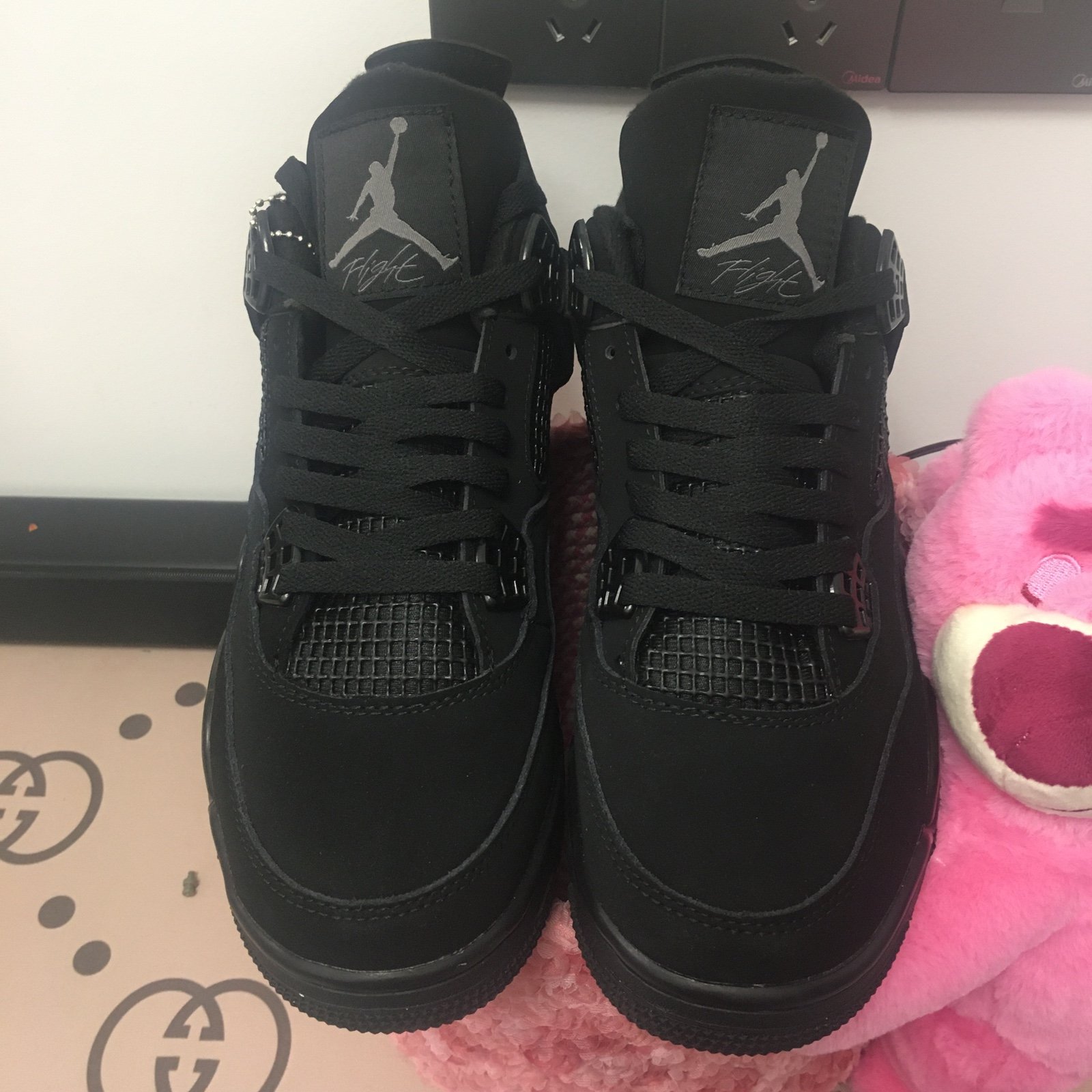 Air Jordan 4 black cat