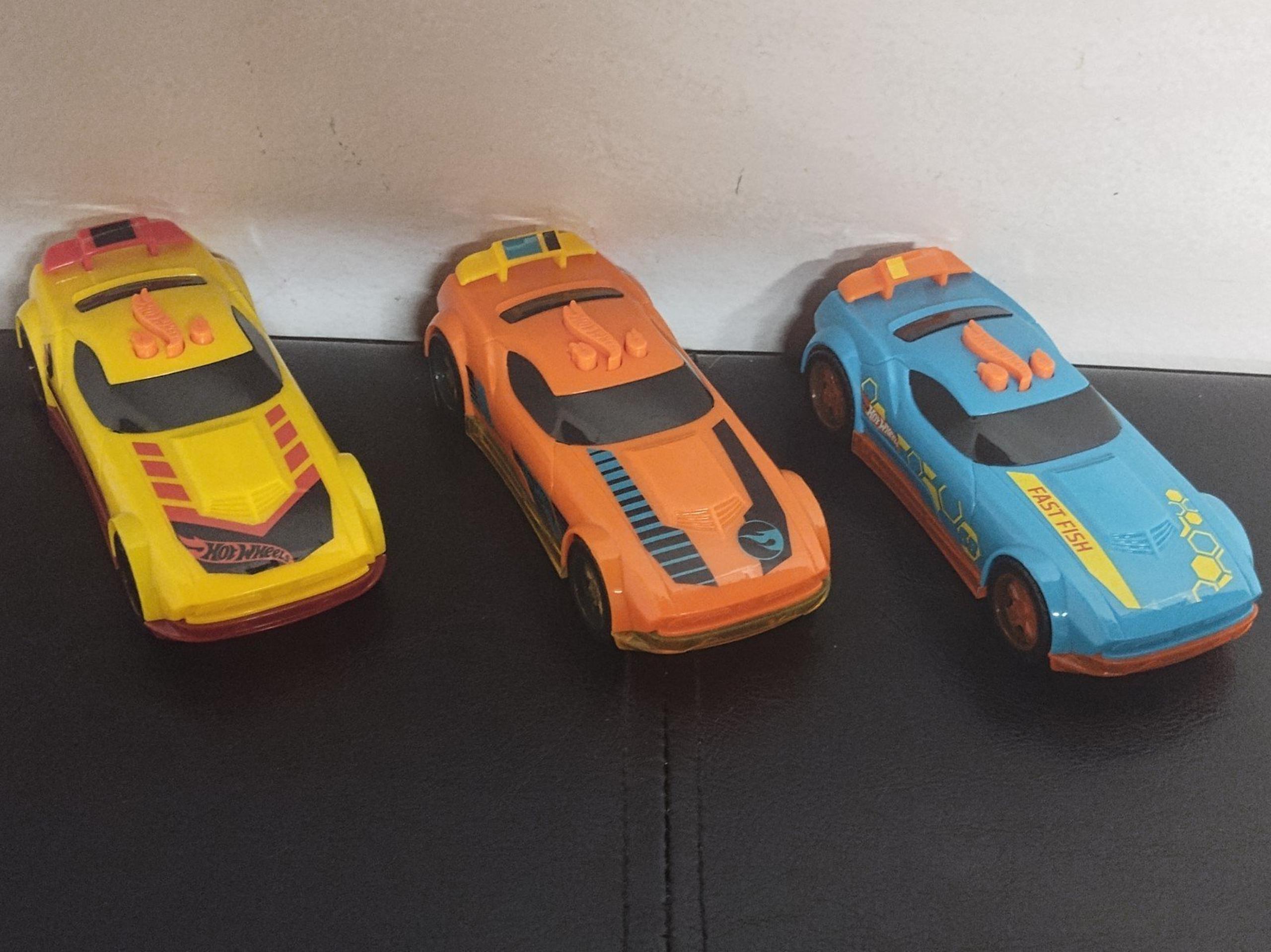 HOT WHEELS GLOW RIDERS BY JUST PLAY 3 PACK LIGHTS AND SOUNDS PULL BACK VEHICLES