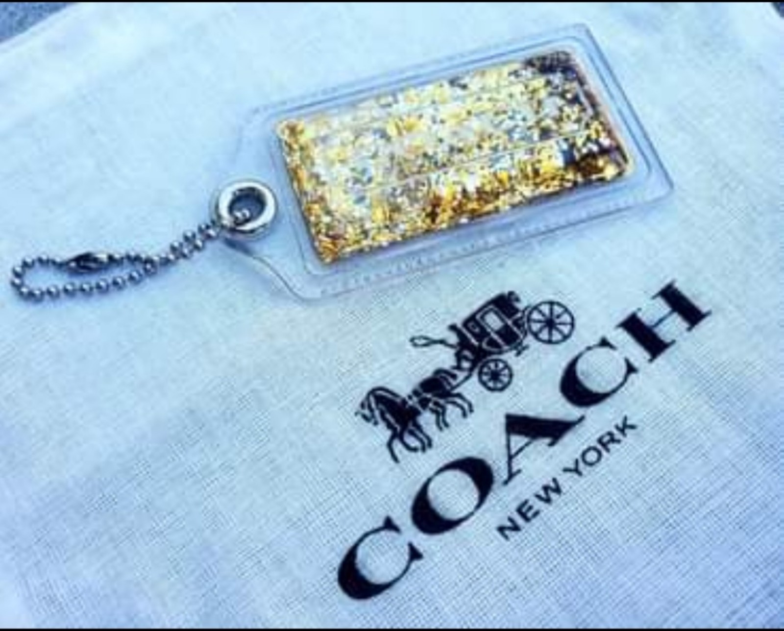 Coach Poppy acrylic floating XL gold silver sparkle hang tag charm accessory
