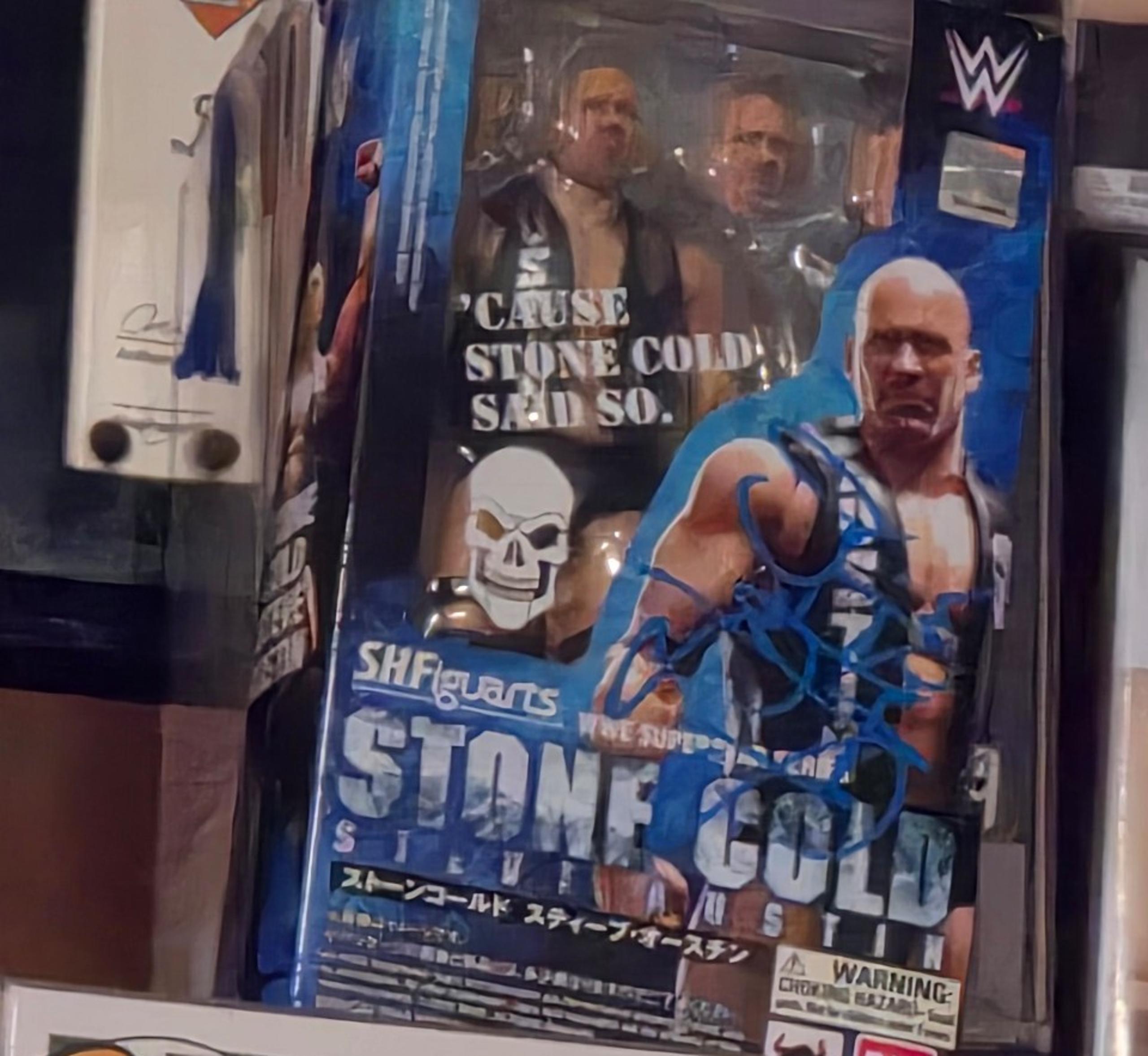 Signed stone cold Steve Austin figure
