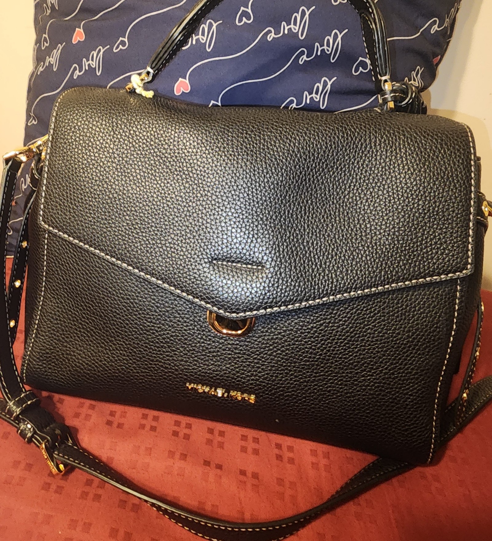 Michael Kors Black Pebbled leather handbag with strap
