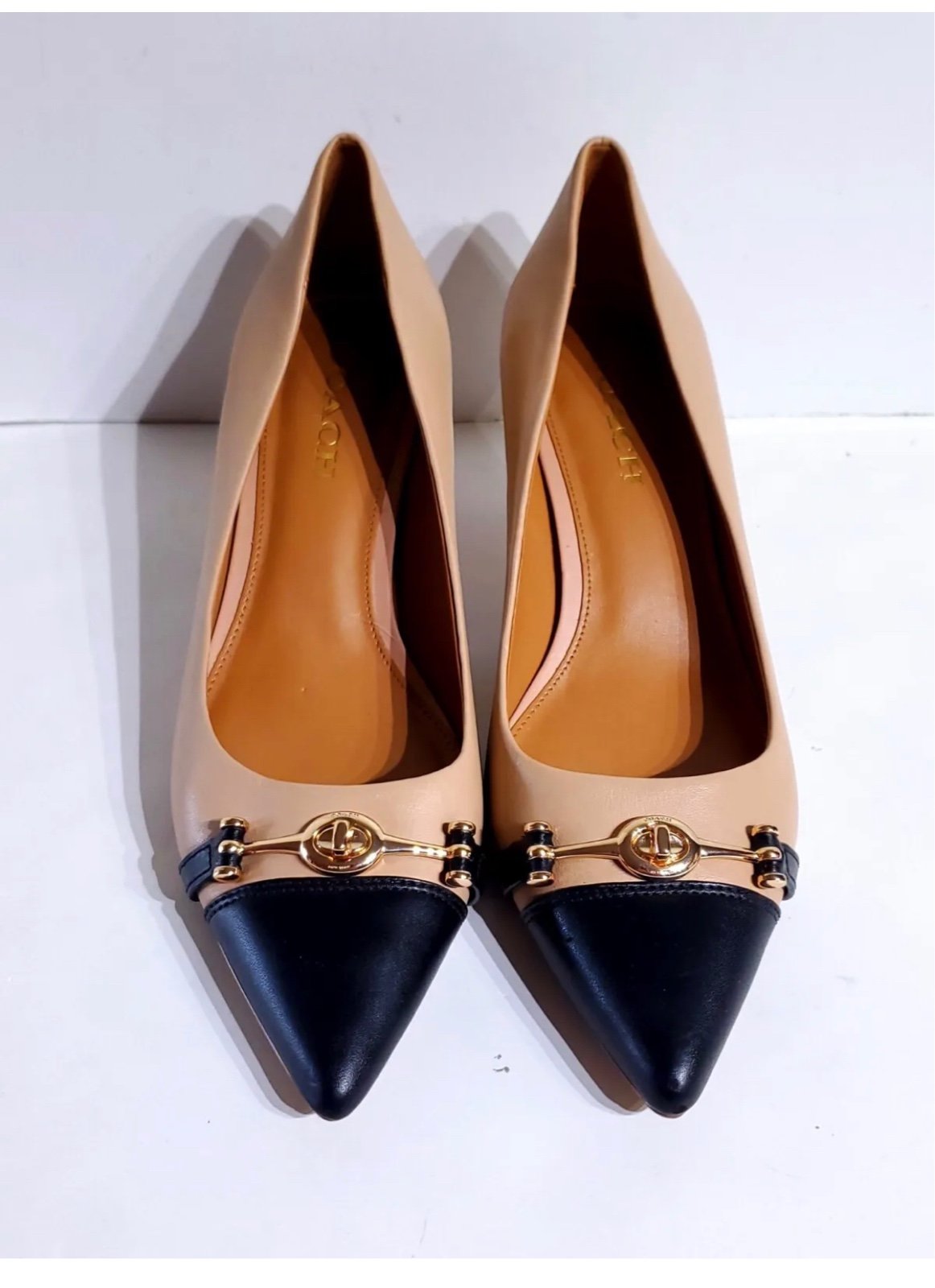 Coach pumps