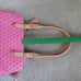 Dooney and Bourke pink signature buckle leather trimmed handbag/purse/shouldbag