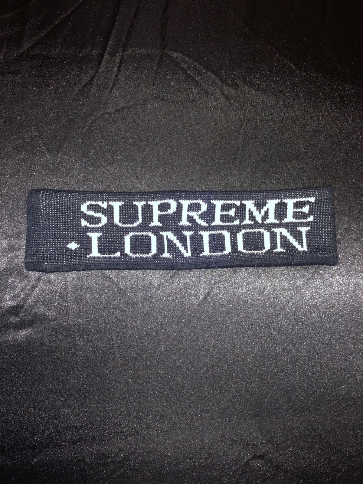 SUPREME INTERNATIONAL HEADBAND