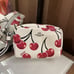 POUCH WRISTLET WITH CHERRY PRINT (COACH CZ470)