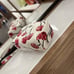 POUCH WRISTLET WITH CHERRY PRINT (COACH CZ470)