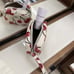 POUCH WRISTLET WITH CHERRY PRINT (COACH CZ470)
