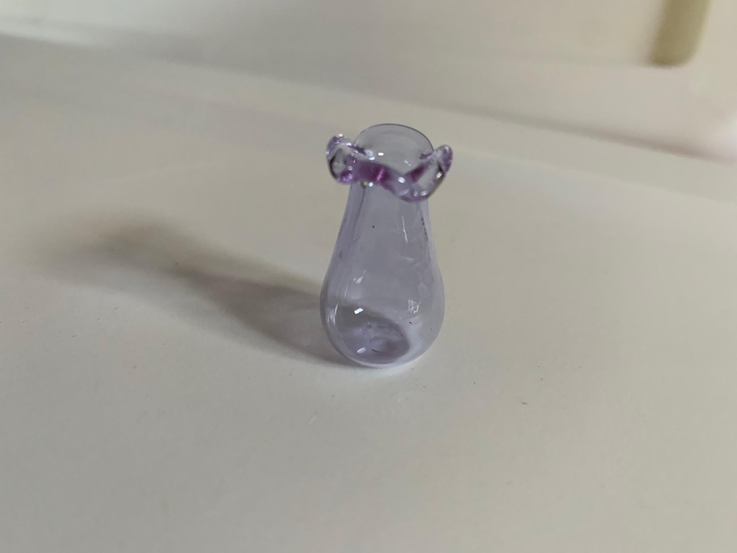 Miniature purple vase for kitty whiskers